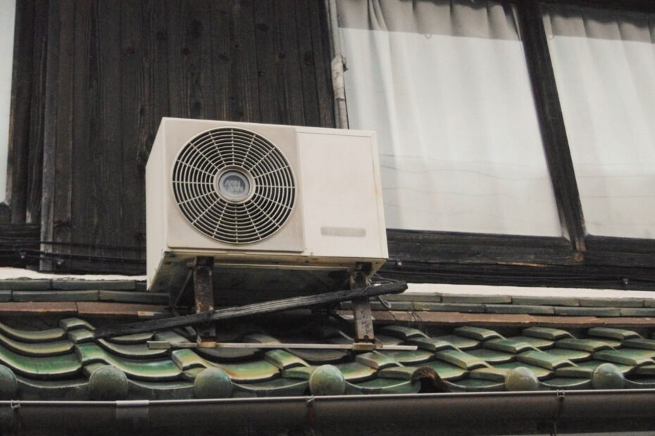 HVAC contractor performing maintenance to extend the lifespan of an air conditioning system